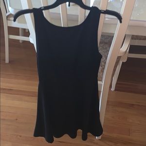 peplum dress with open back